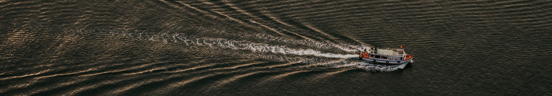 Birds eye view of a boat moving through water